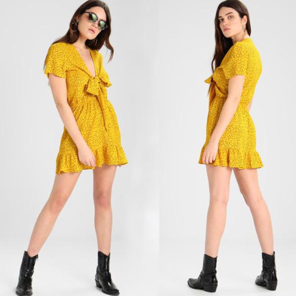 Mulheres amarelas sexy do vestido do às bolinhas do laço glamoroso do vestido do dia