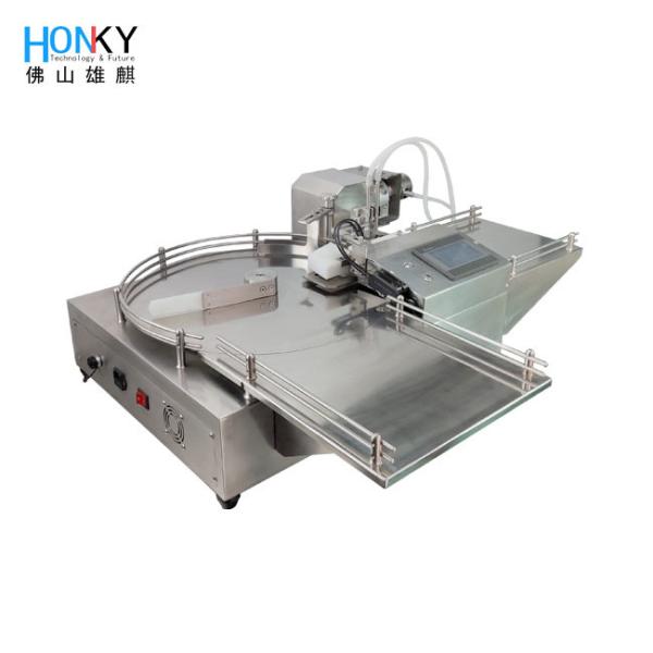 Machine de remplissage de bouteilles rondes de bureau avec système de remplissage à double tête pour le remplissage essentiel de liquide d'huile