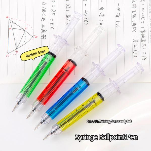 Plume à bille créative en forme de seringue Plume à bille en plastique colorée remplie d'huile