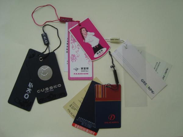 Roupa luxuosa impressa feita sob encomenda Hang Tags Embossed Silver Foil de papel que carimba o logotipo