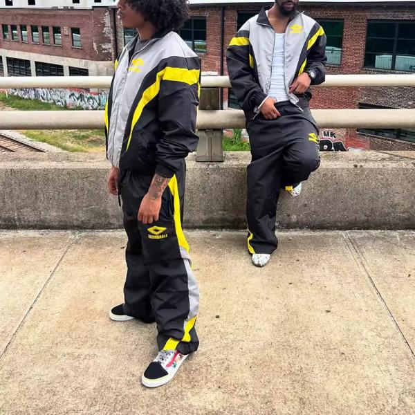 Veste de veste de vent personnalisée empilée ampouleuse en forme de survêtement en nylon ensemble de survêtement en nylon