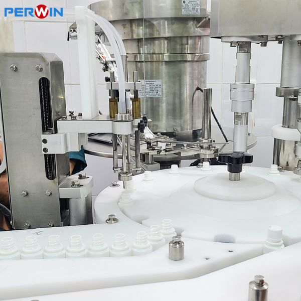 600mm Turntable Buffering Diagnostic Reagent Filling Line with Pneumatic Bottle Fixing and Servo Motor Capping Power