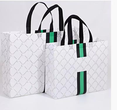 Logo Printed Gilding Striped Apparel Paper Bag Packaging For Clothes