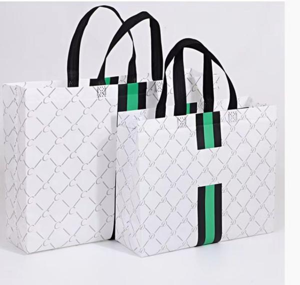 Logo Printed Gilding Striped Apparel Paper Bag Packaging For Clothes