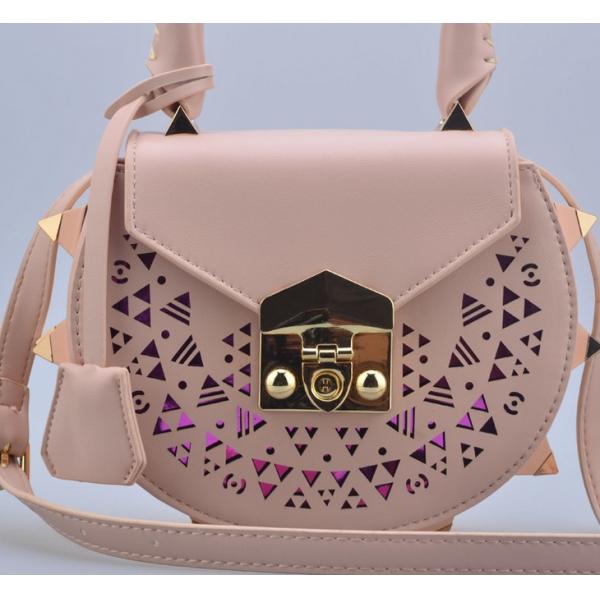 2016 Korean version of the new shoulder bag female fashion rivets hollow pattern portable diagonal package
