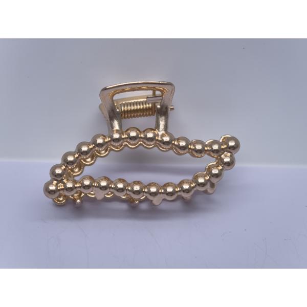 Des pinces à griffes métalliques légères pour les cheveux