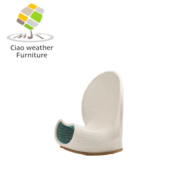 Experience Comfort and Style with this Modern Rattan Lounge Chair in Special Shell Shape