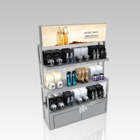 Étagère en fer gris et en bois de magasin de beauté avec boîte lumineuse pour la conception des magasins de soins de la peau et la décoration des magasins de détail