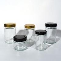 Utilisation dans les usines alimentaires 1 oz 4 oz 8 oz Ronde en forme de récipient de stockage vide clair en verre confiture de gelée sauce au miel pot