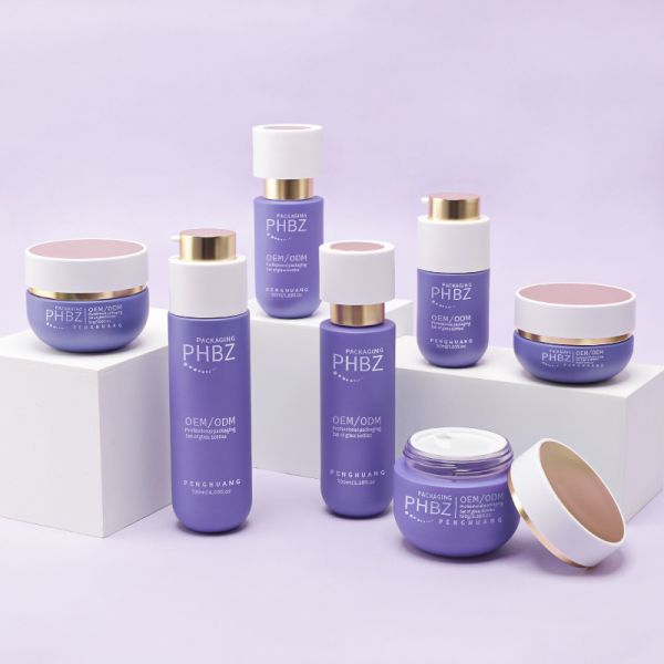 Comprehensive Cosmetic Packaging Set featuring luxury glass bottles golden cap lotion bottles cream jars and cosmetic packaging