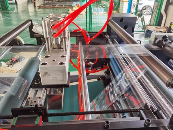 SINO JIGUO TC-760C Máquina automática para remendar ventanasCon función de corte de esquinas y de arrugas, velocidad máxima de trabajo plana: 10000 s/h,V velocidad máxima de corte: