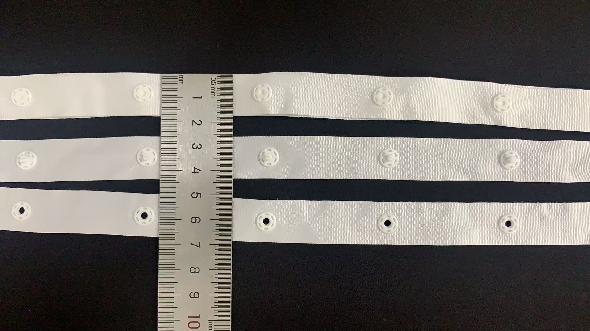 Factory wholesaler 30*30mm/75*75mm Polyester /nylon Snap Button Tape for Baby Infant Wear and  Jacket 