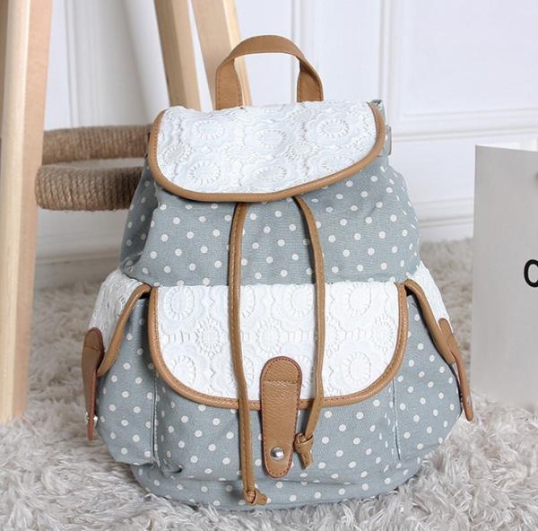2016 new winter female European and American fashion jacquard material dot pattern lace embroidered backpack canvas bag