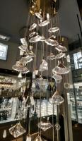 Lustre en cristal de luxe en forme de ventilateur, haut plafond, longue échelle, lustre pour la décoration familiale d'hôtels.