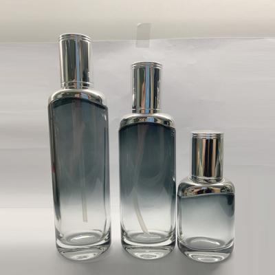 40ml 100ml 120ml Glass Lotion Bottle Set With Metallic Silver Shoulder