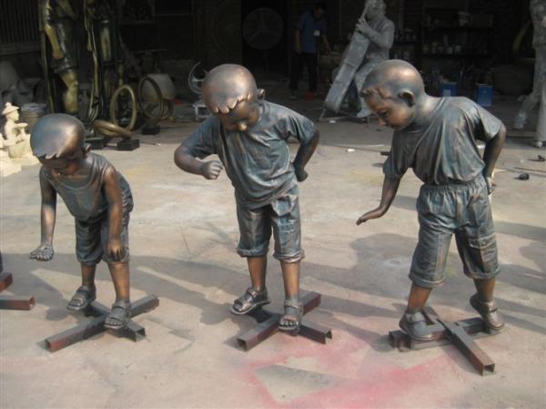 garden bronze children playing statue