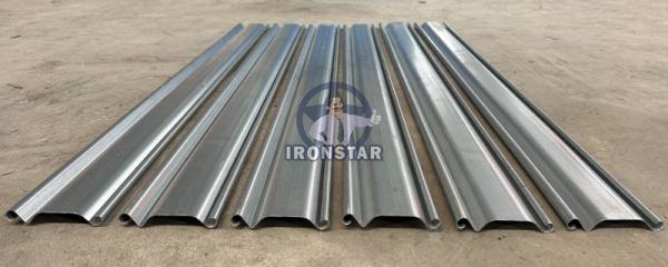 30-50m/min fast speed cutting rolling shutter door roll forming machine in Brazil Raw material: Galvanized steel
