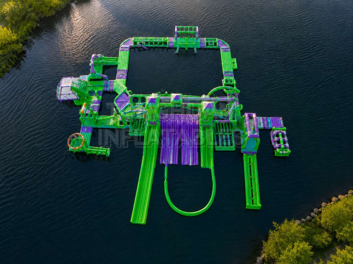 Custom Large Floating Inflatable Water Park with Multi Lane Slides Towers Obstacles and Aqua Playground Modules for Resorts Lakes Camps and Rental Operations