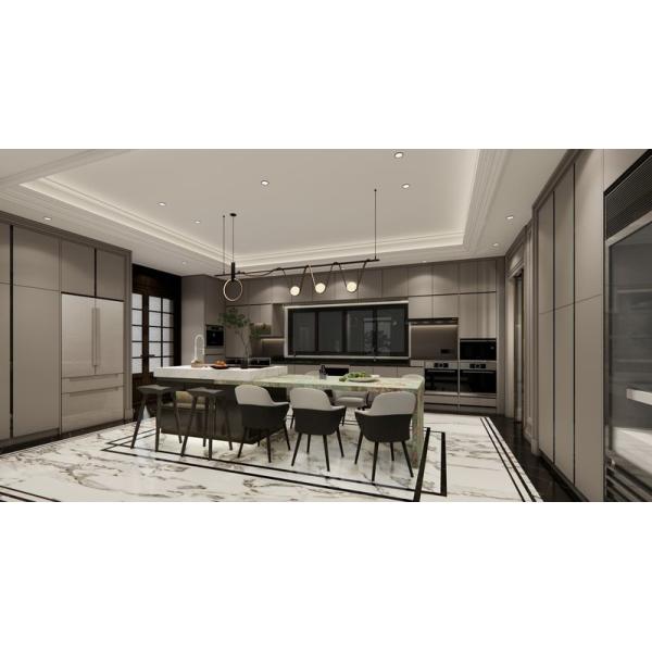 Cuisine en acier inoxydable de luxe en forme de U avec une île impressionnante