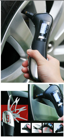tire gauge with LED flashlight & emergency hammer .