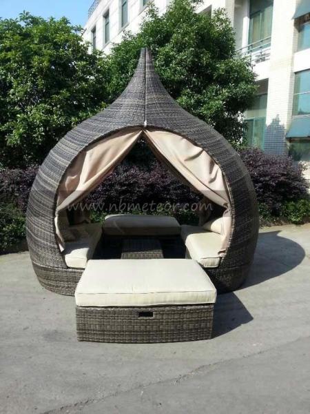 Round Wicker Daybed with Natural Appeal for Outdoor Relaxation