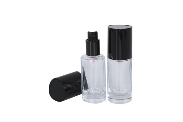 Tamanho cosmético de vidro claro triangular do curso da garrafa da bomba 30ml