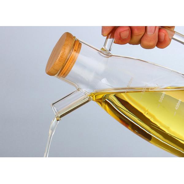 Ясная стеклянная бутылка оливкового масла 650мл с бамбуковой крышкой