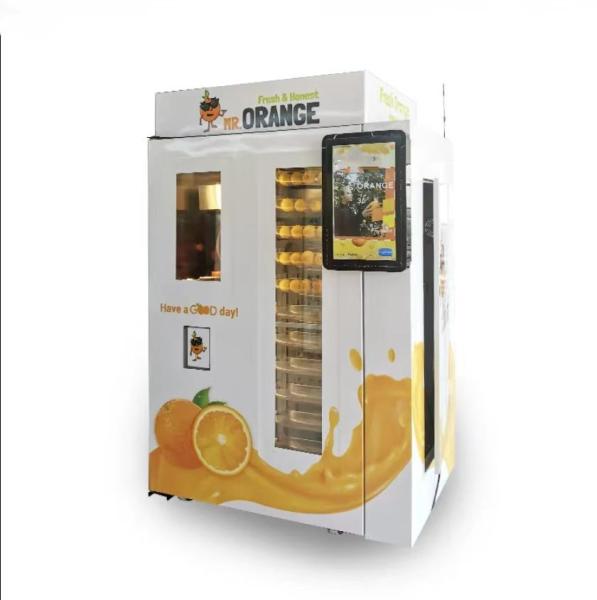 冷却装置が付いているノートの支払のオレンジ ジュースの自動販売機