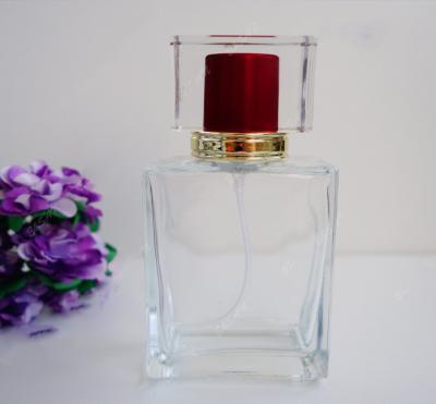 Botellas de perfume de cristal cuadradas claras con el volumen a prueba de niños del casquillo 50ml