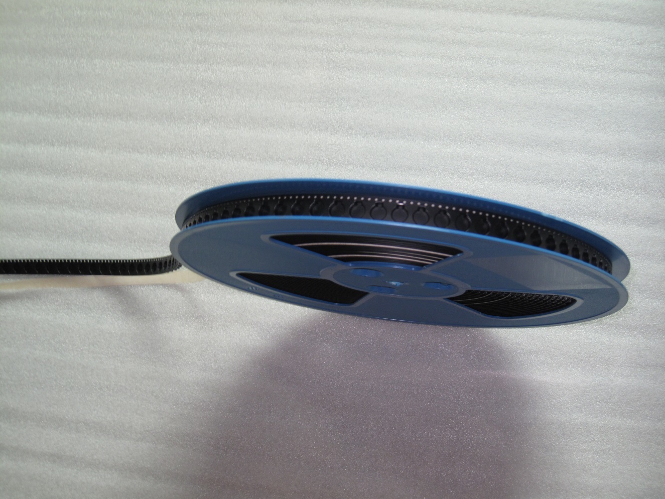 Black PS Embossed Carrier Tape for Precision SMT Component Pocket Packaging