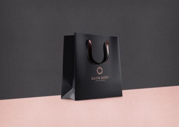 Luxury gift kraftpaper bag with silk ribbon handle