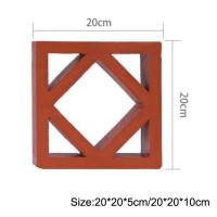La fenêtre décorative creuse de briques de terre cuite de Jali de cour a perforé des tuiles de mur
