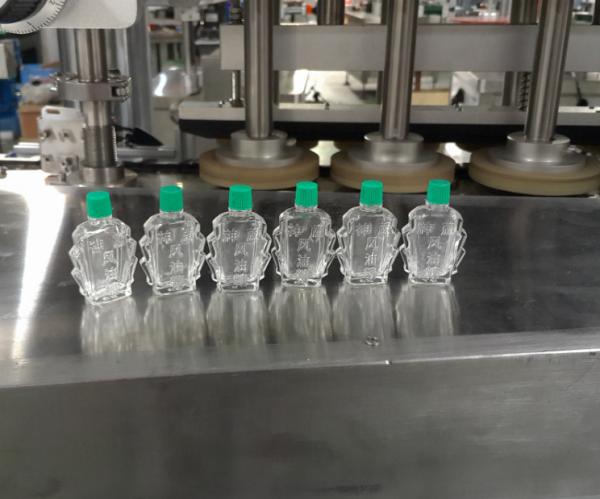 Máquina de fecho de garrafas de vidro de pequena capacidade para óleos essenciais e óleos medicamentosos