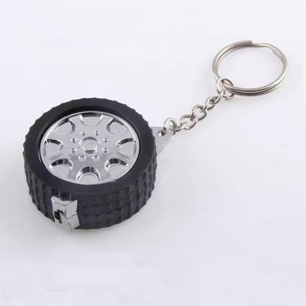 Автомобильный логотип шины шины в форме рекламных подарков мини-вытяжной стальной ленты мерой ключевой цепочки мерой ленты