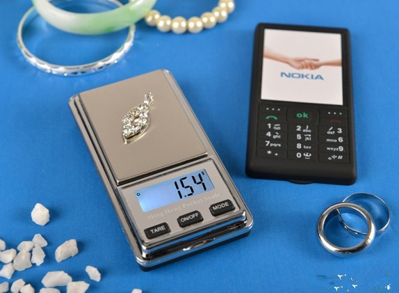 Pocket scale with white backlight