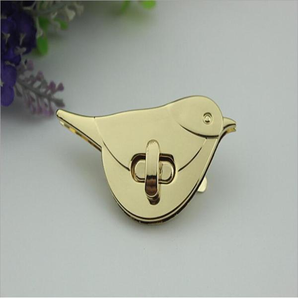 Ladies handbags metal bird pattern high quality light gold turn twist locks