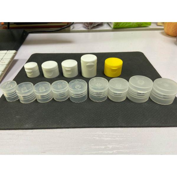 A tela que imprime as peças plásticas de 24/410 de garrafa tampa tampas