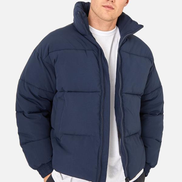 Fabricante de ropa diseñador chaqueta acolchada con polvo logotipo de OEM de gran tamaño chaqueta acolchada de invierno con bolboreta de invierno