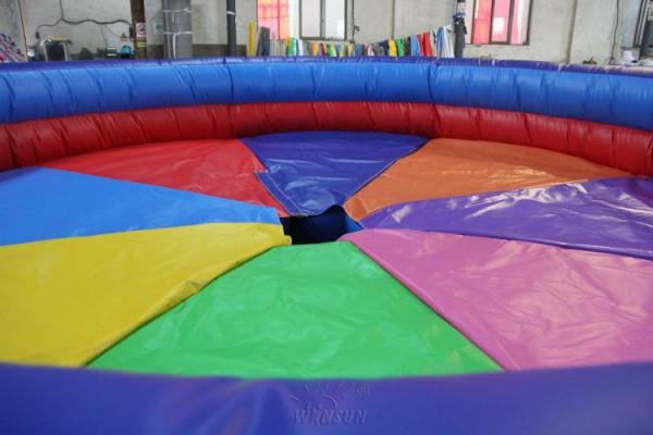 Waterproof Sports Themed Bounce House Revolution Wheel Inflatable Mat Eco - Friendly