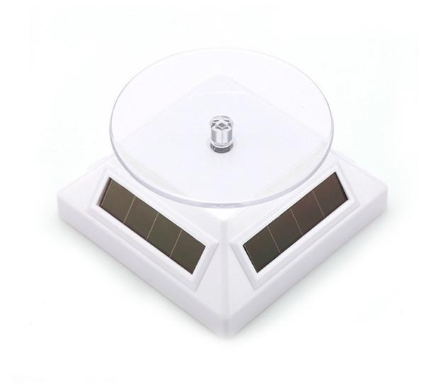 Black White 360 Degree Solar Powered Rotating Stand For Cosmetics