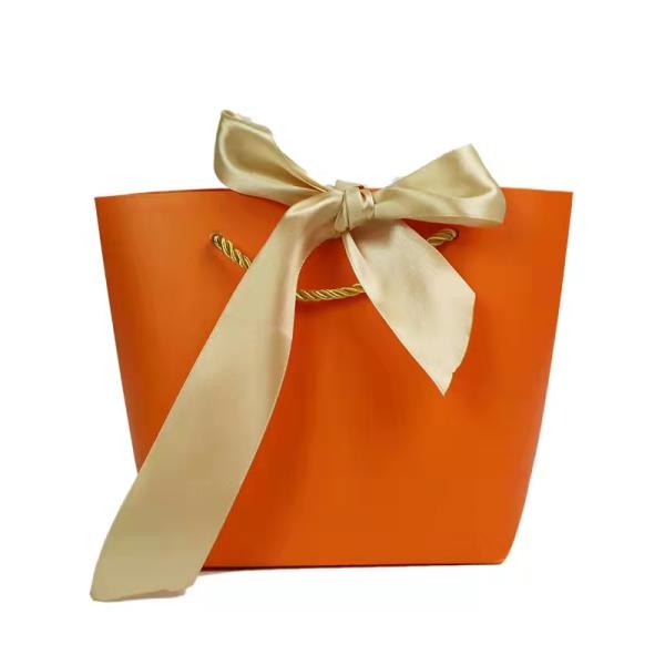 Персонализированный роскошный на заказ ремесла Ручная работа Розовая покрытая художественная бумага Косметика Одежда Ювелирные изделия Подарочные сумки Маленькие