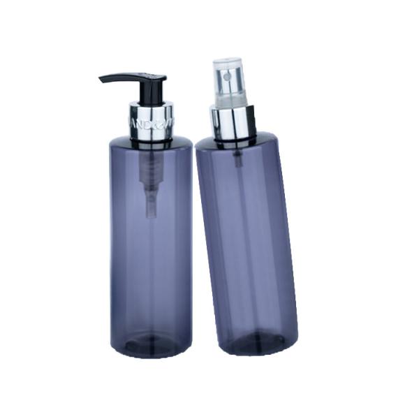 Bouteille cylindrique transparente bleue en plastique de 250 ml avec pompe/spray