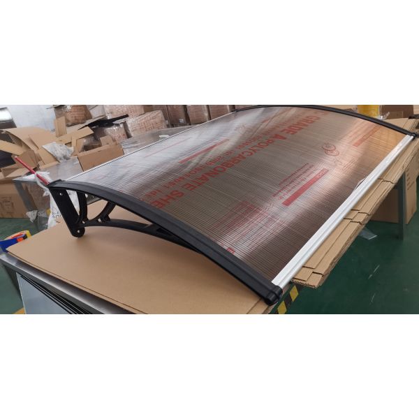 Brown Window Polycarbonate awning featuring plastic or aluminum bracket designed to provide long lasting protection and enhanced aesthetic appeal