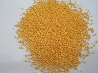 L'orange tachette les taches colorées que le de sodium sulfate les taches basses pour la poudre détersive
