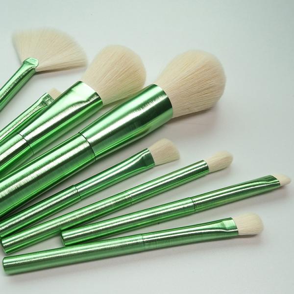 Яркий ый-зелен овальный набор щетки макияжа 8 частей белых синтетических волос