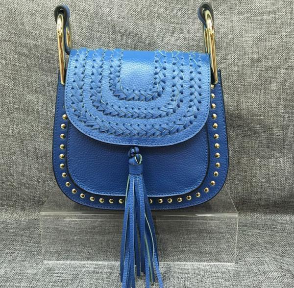 Female head layer of leather 2016 new European and American fashion rivet fringed shoulder bag Messenger packet