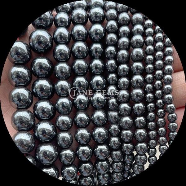 Perles de pierre précieuse polissées de 8 mm hématite yooperlite et autres types de pierre de guérison en cristal