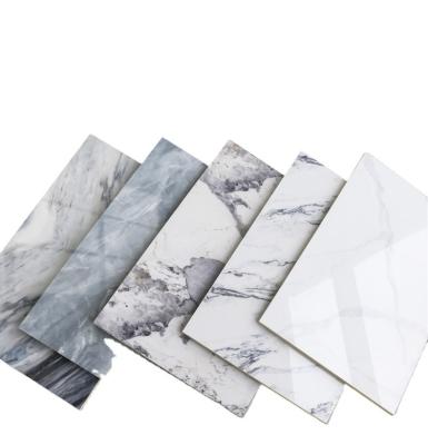 Transforme su interior con paneles de pared de PVC estilo moderno y revestimiento SPC impermeable
