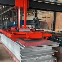 Robot automatique de chargement et de déchargement de dalles de pierre et de plaques de gypse
