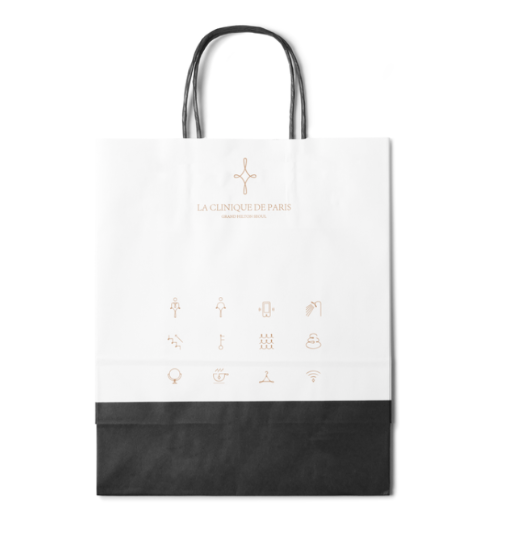 Custom White Kraft Paper Bag with Paper Rope Handle Eco‑Friendly Hot Stamping Gift Bag, Superior Print Compatibility for Hotel, Spa & Creative Industries